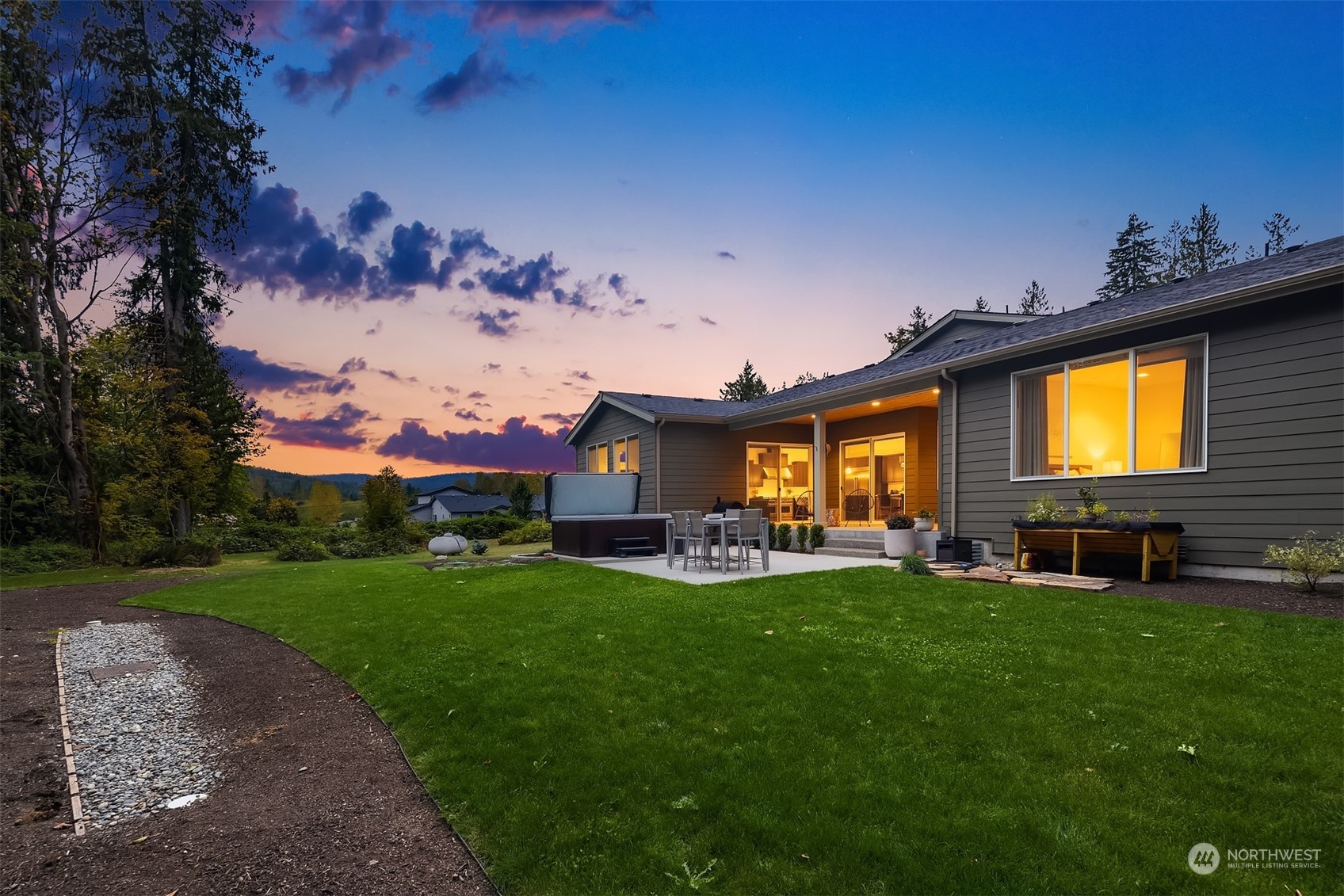 36234 Southeast Fish Hatchery Road Fall City, WA 98024 - Photo 30 of 40 a view of a house with a backyard and a patio