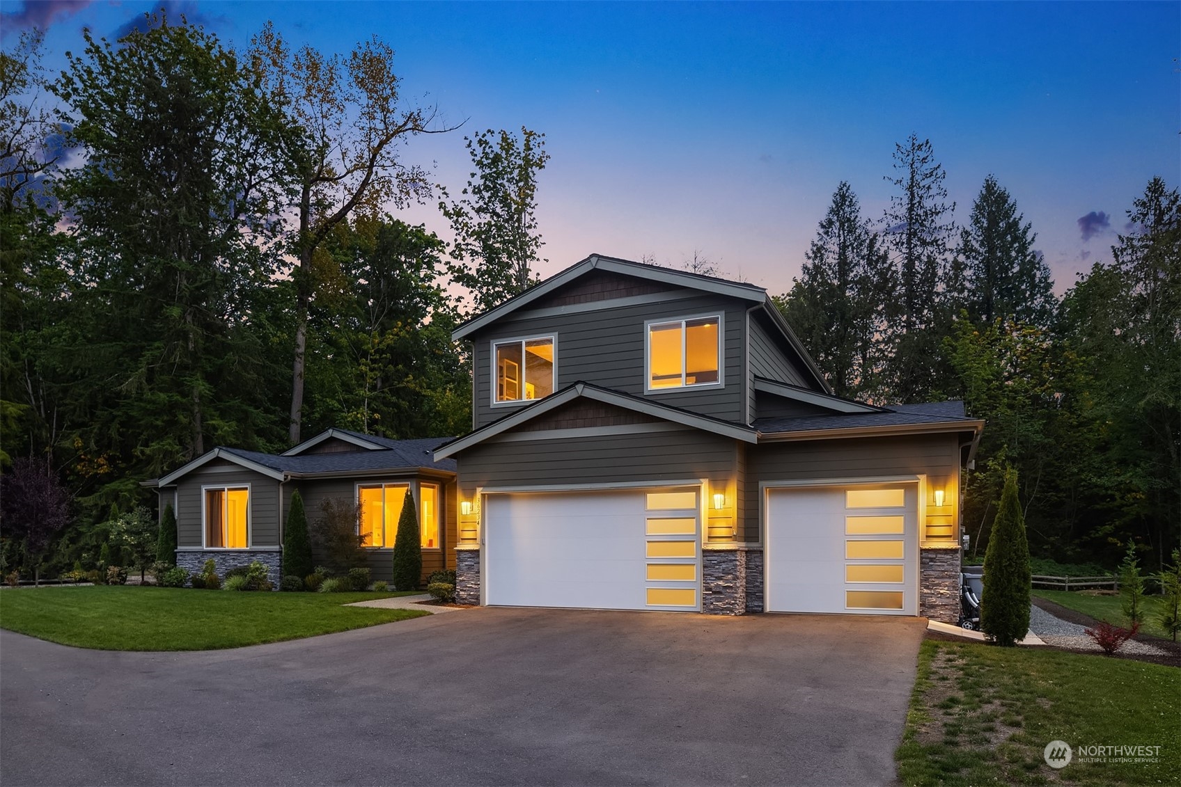 36234 Southeast Fish Hatchery Road Fall City, WA 98024 - Photo 35 of 40 a front view of a house with a yard and garage
