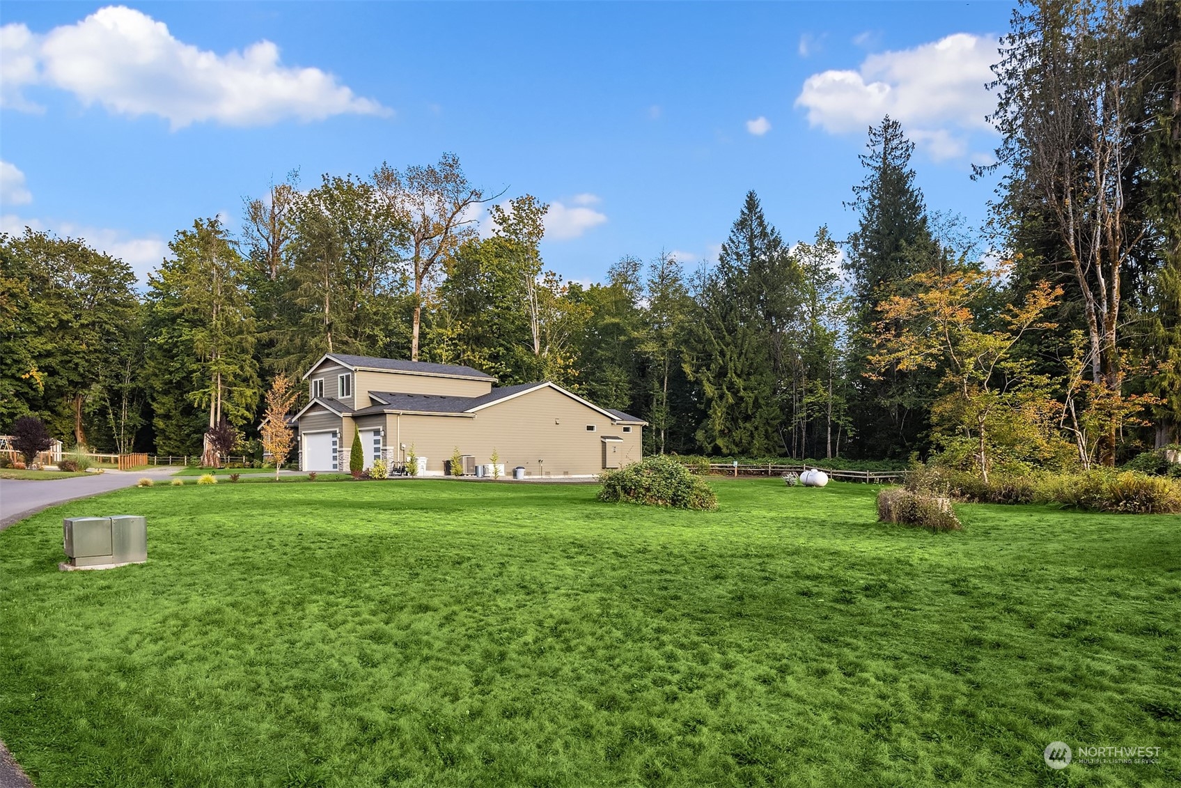 36234 Southeast Fish Hatchery Road Fall City, WA 98024 - Photo 39 of 40 a view of a house with a yard and basketball ground