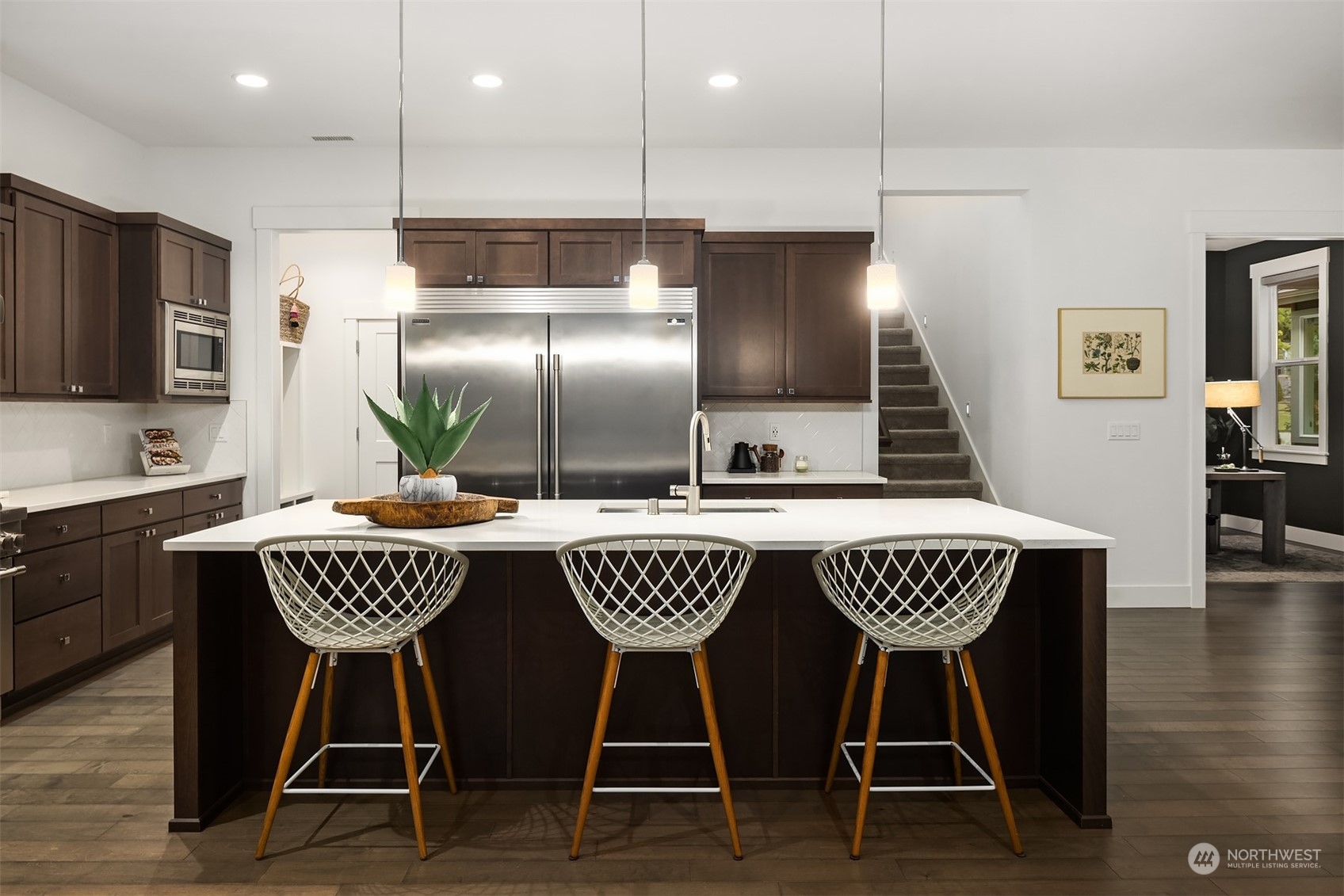 36234 Southeast Fish Hatchery Road Fall City, WA 98024 - Photo 9 of 40 a kitchen with a dining table and chairs