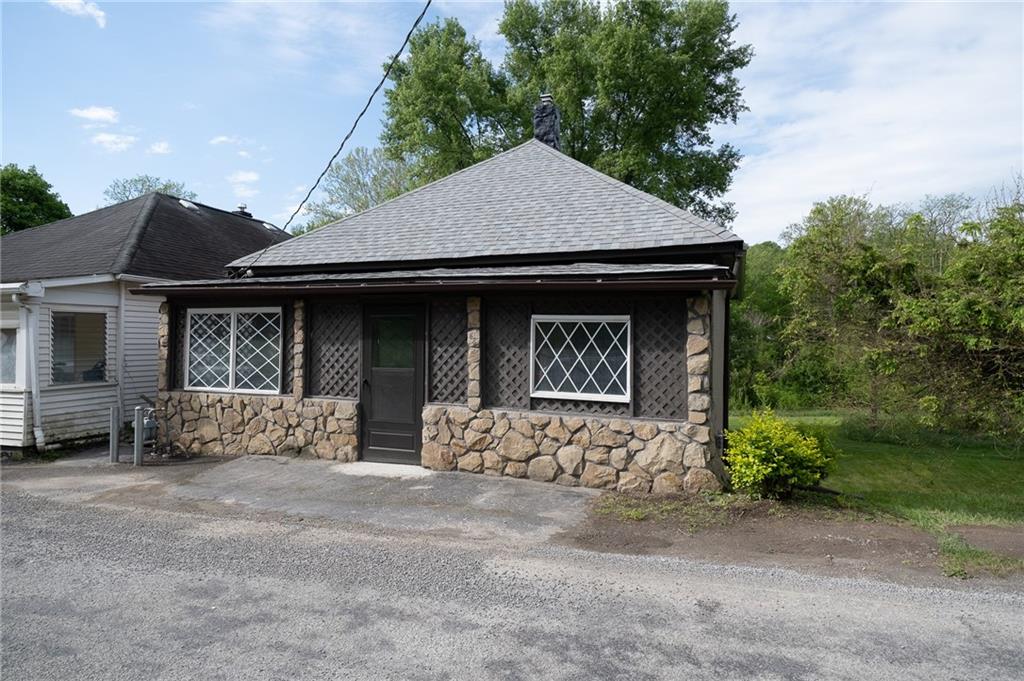 68 Browntown Road Avella, PA 15312 - Photo 2 of 33 Gorgeous stone front.....Enjoy sitting on your enclosed front porch protected from the weather