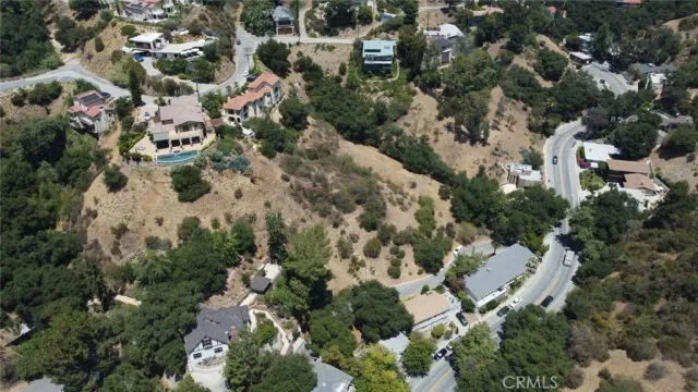 an aerial view of residential house with outdoor space