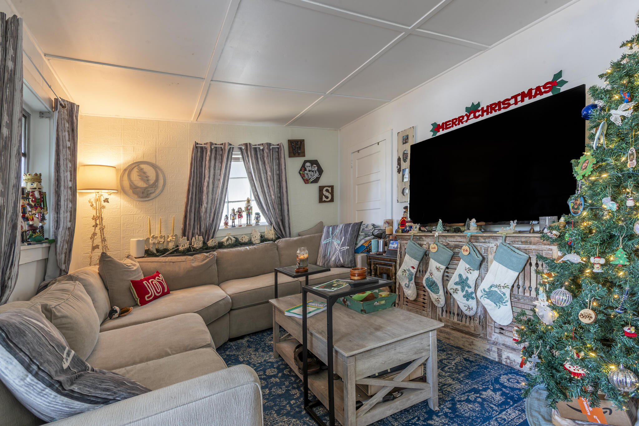 1401 5th Street Key West, FL 33040 - Photo 18 of 21 a living room with furniture and a flat screen tv