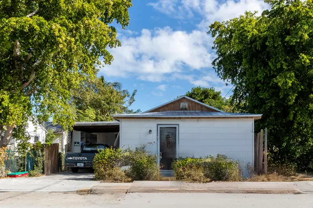 front view of a house with a street