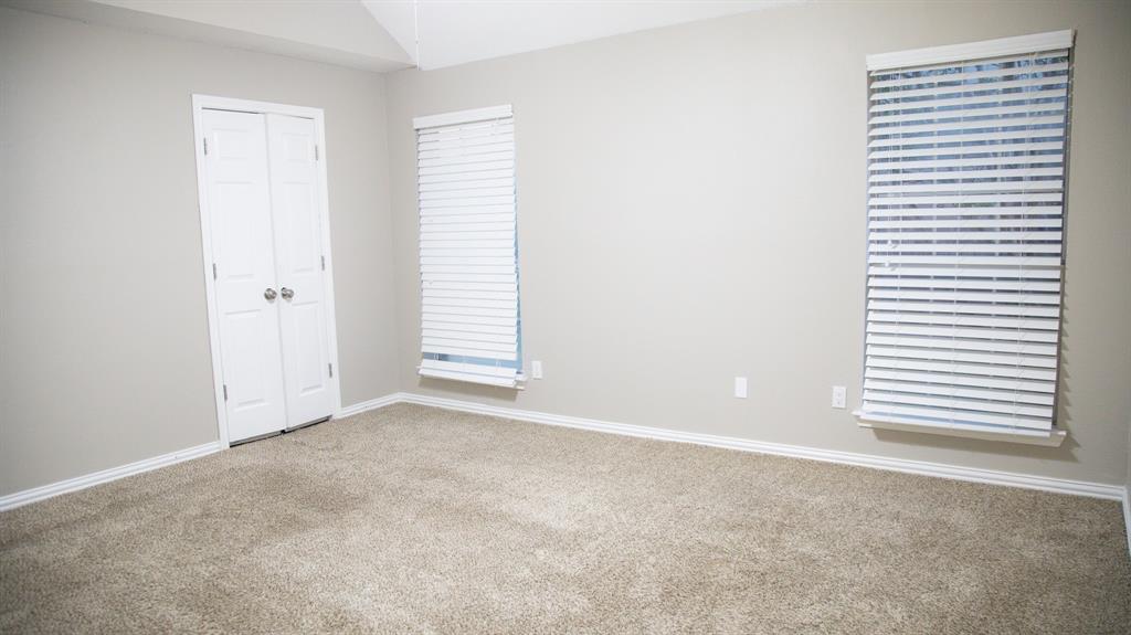 2129 Fawn Ridge Trail Carrollton, TX 75010 - Photo 5 of 30 an empty room with windows