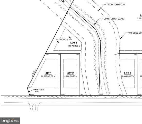 a black and white photo of a field