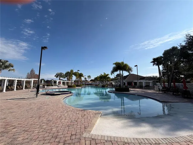 a lobby with furniture and window