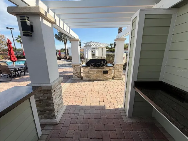 a lobby with furniture and window