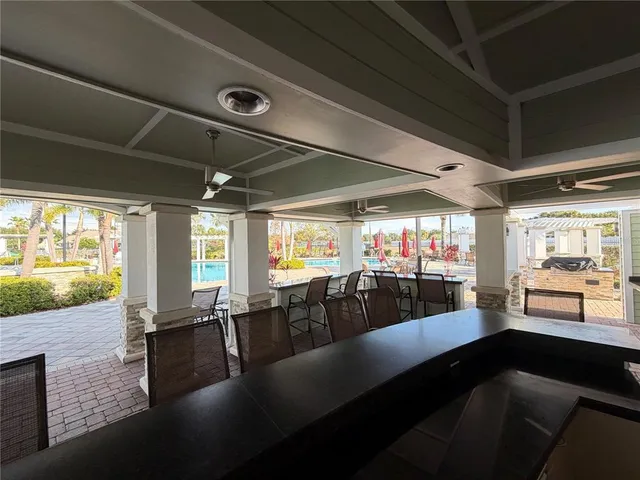 a room with lots of furniture and garden