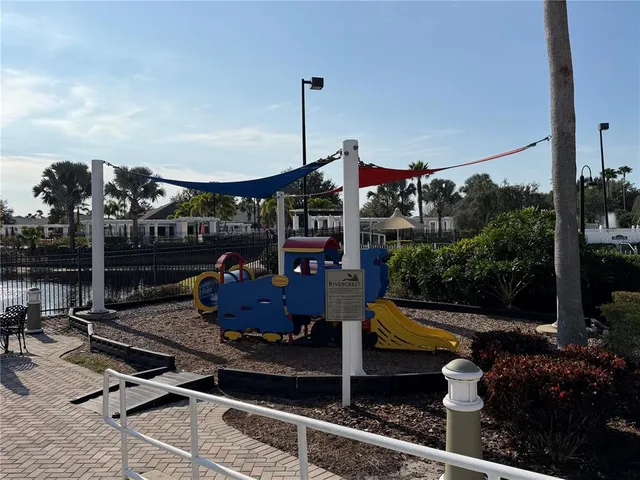 a view of a swimming pool with a terrace