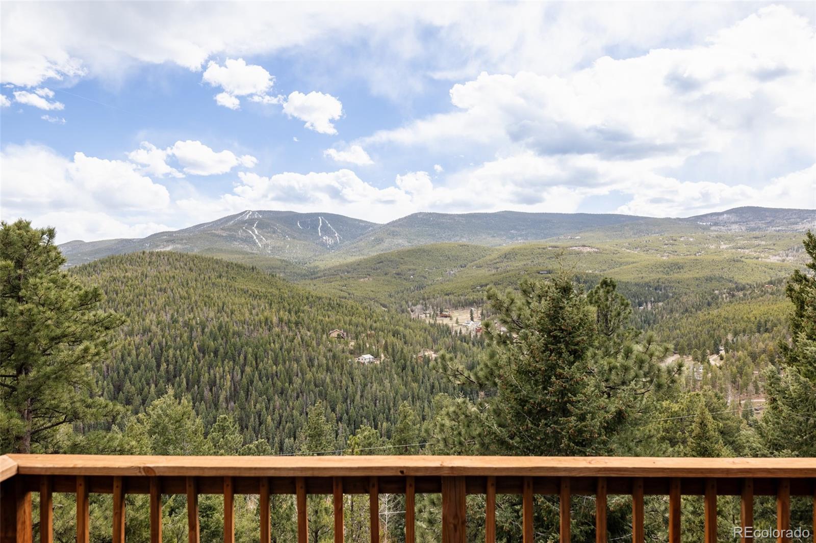 7290 Timber Trail Road Evergreen, CO 80439 - Photo 3 of 11 a view of city from a balcony