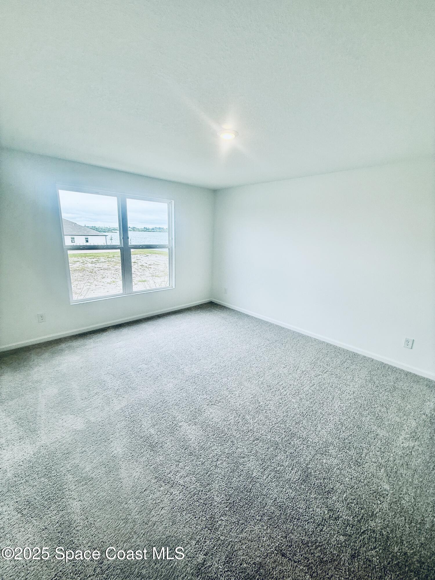 1858 Bluewater Lane Rockledge, FL 32955 - Photo 10 of 17 20251208_173139861_iOS