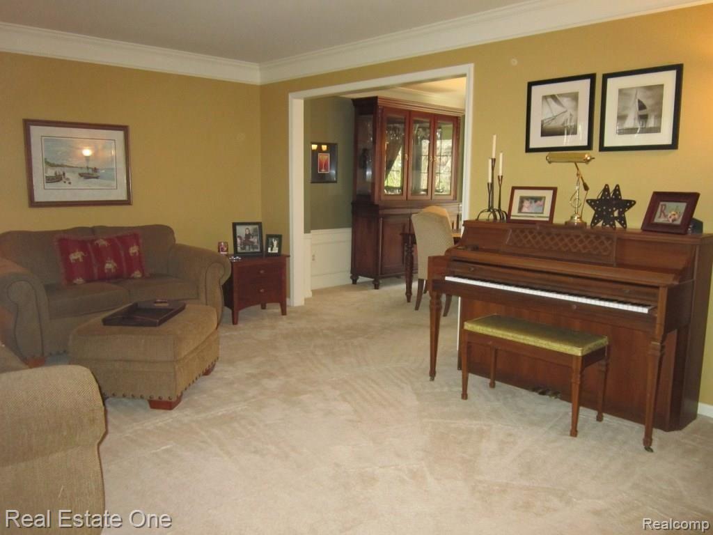 45347 Courtview Trail Novi, MI 48375 - Photo 7 of 31 living to dining.JPG