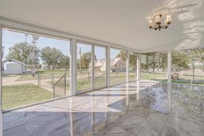 3952 Tin Top Road Weatherford, TX 76087 - Photo 11 of 39 a view of porch with a floor to ceiling window