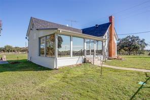 3952 Tin Top Road Weatherford, TX 76087 - Photo 12 of 39 a view of a house with backyard and porch
