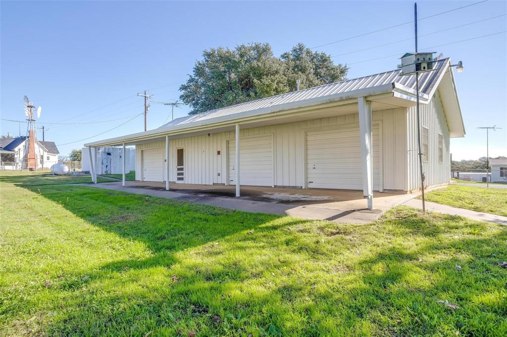 3952 Tin Top Road Weatherford, TX 76087 - Photo 16 of 39 a view of a house with backyard and porch
