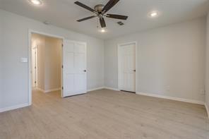 3952 Tin Top Road Weatherford, TX 76087 - Photo 22 of 39 an empty room with chandelier fan