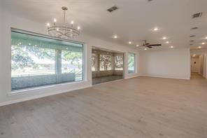 3952 Tin Top Road Weatherford, TX 76087 - Photo 35 of 39 a view of a chandelier and window in a room