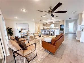 3952 Tin Top Road Weatherford, TX 76087 - Photo 37 of 39 a living room with furniture and a large window