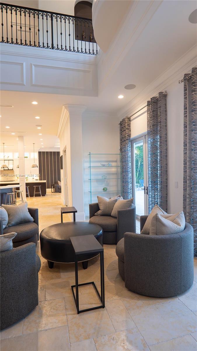 959 Eve Street Delray Beach, FL 33483 - Photo 12 of 74 a living room with furniture and a large window