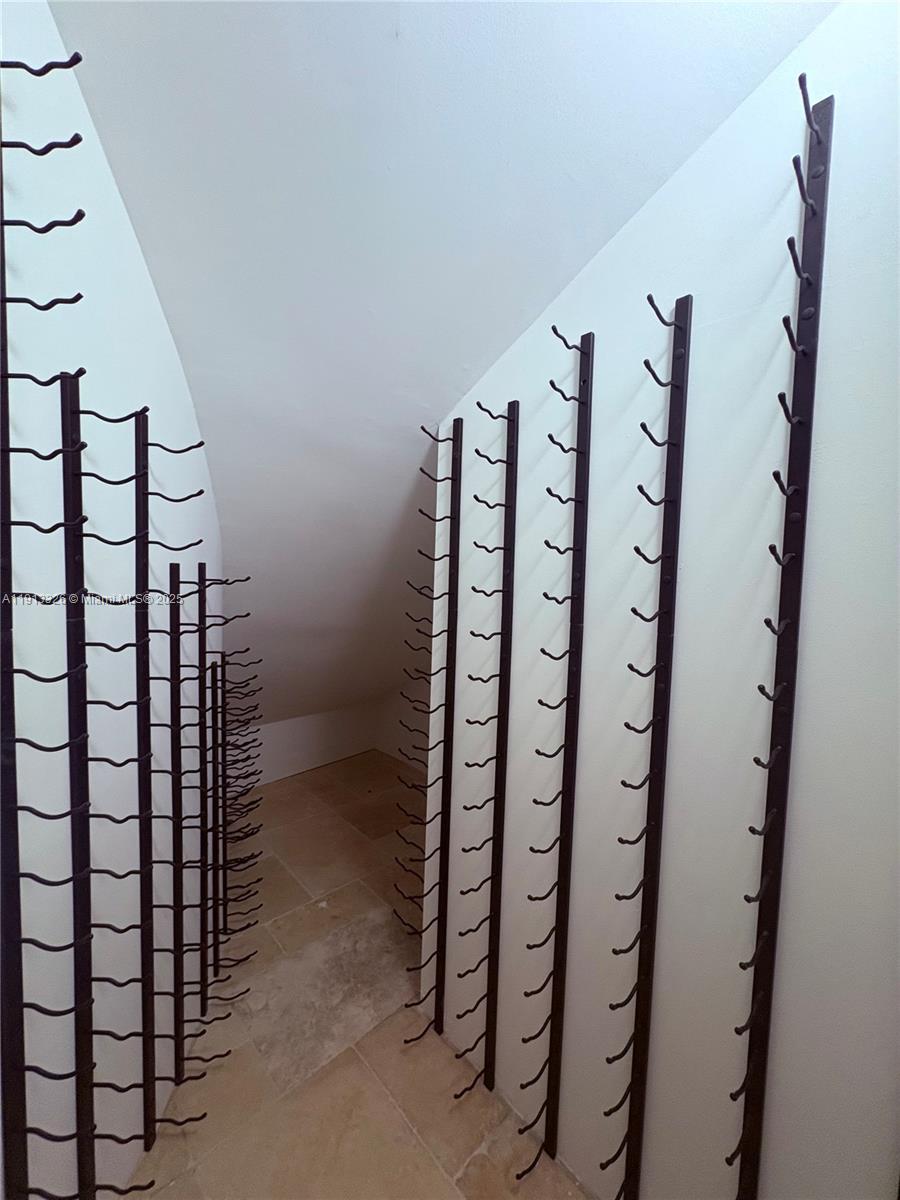 959 Eve Street Delray Beach, FL 33483 - Photo 18 of 74 a view of staircase with railing and white walls