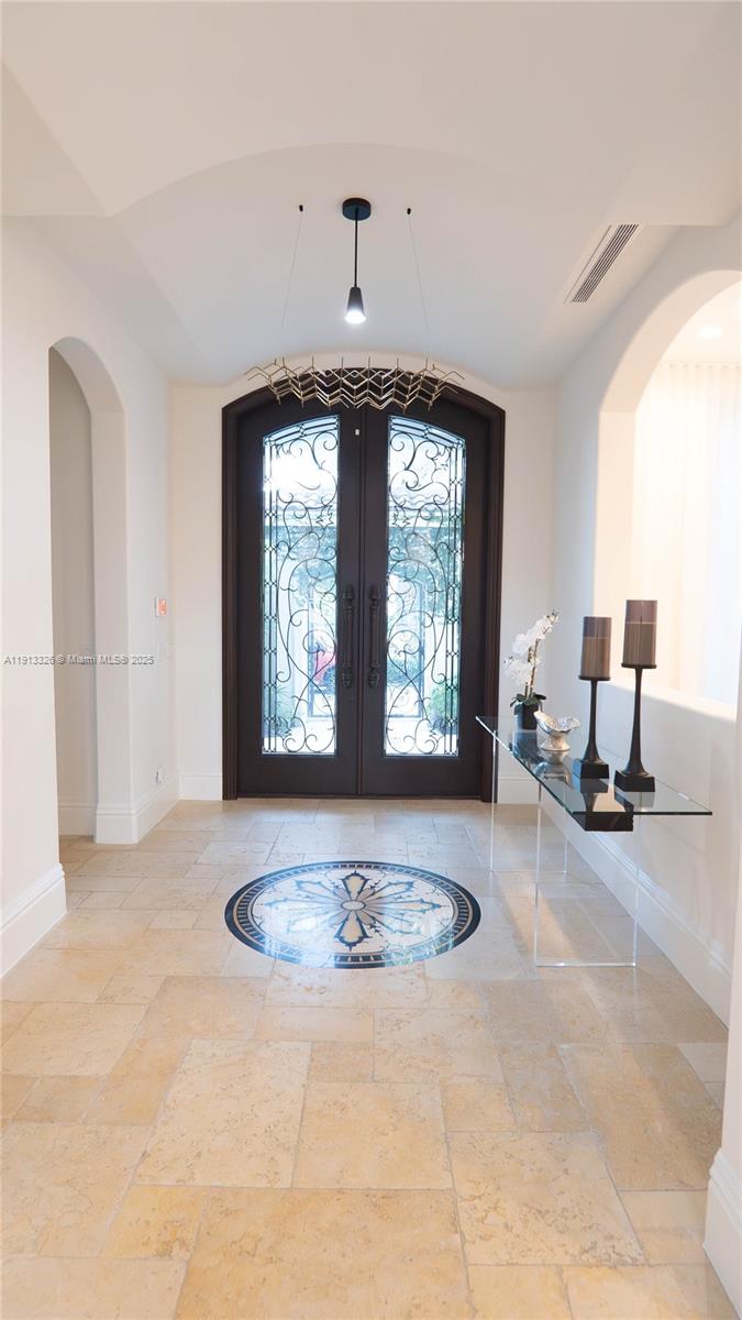 959 Eve Street Delray Beach, FL 33483 - Photo 4 of 74 a view of a livingroom with a fireplace and a window