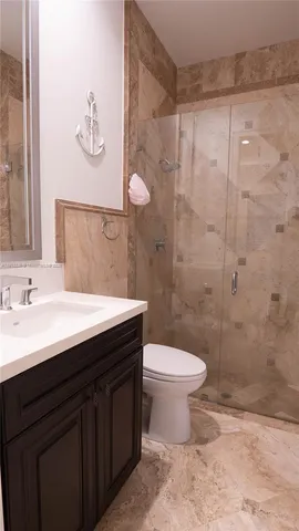 an empty room with wooden floor