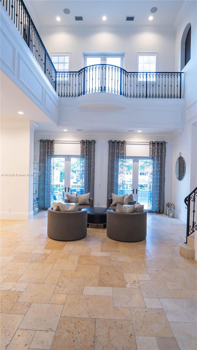 959 Eve Street Delray Beach, FL 33483 - Photo 5 of 74 a living room with furniture and a large window
