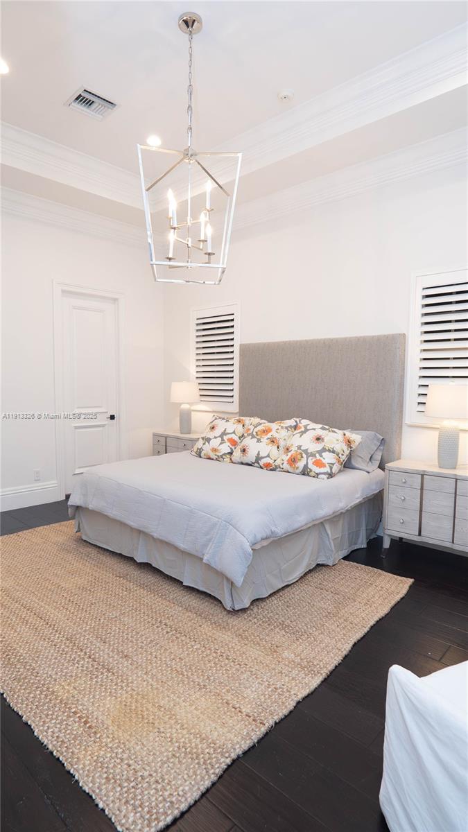 959 Eve Street Delray Beach, FL 33483 - Photo 52 of 74 a bedroom with a bed and window