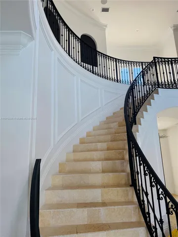 a view of a livingroom with furniture and a chandelier