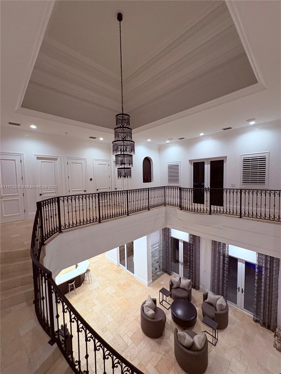 959 Eve Street Delray Beach, FL 33483 - Photo 10 of 74 a view of a livingroom with furniture and a chandelier