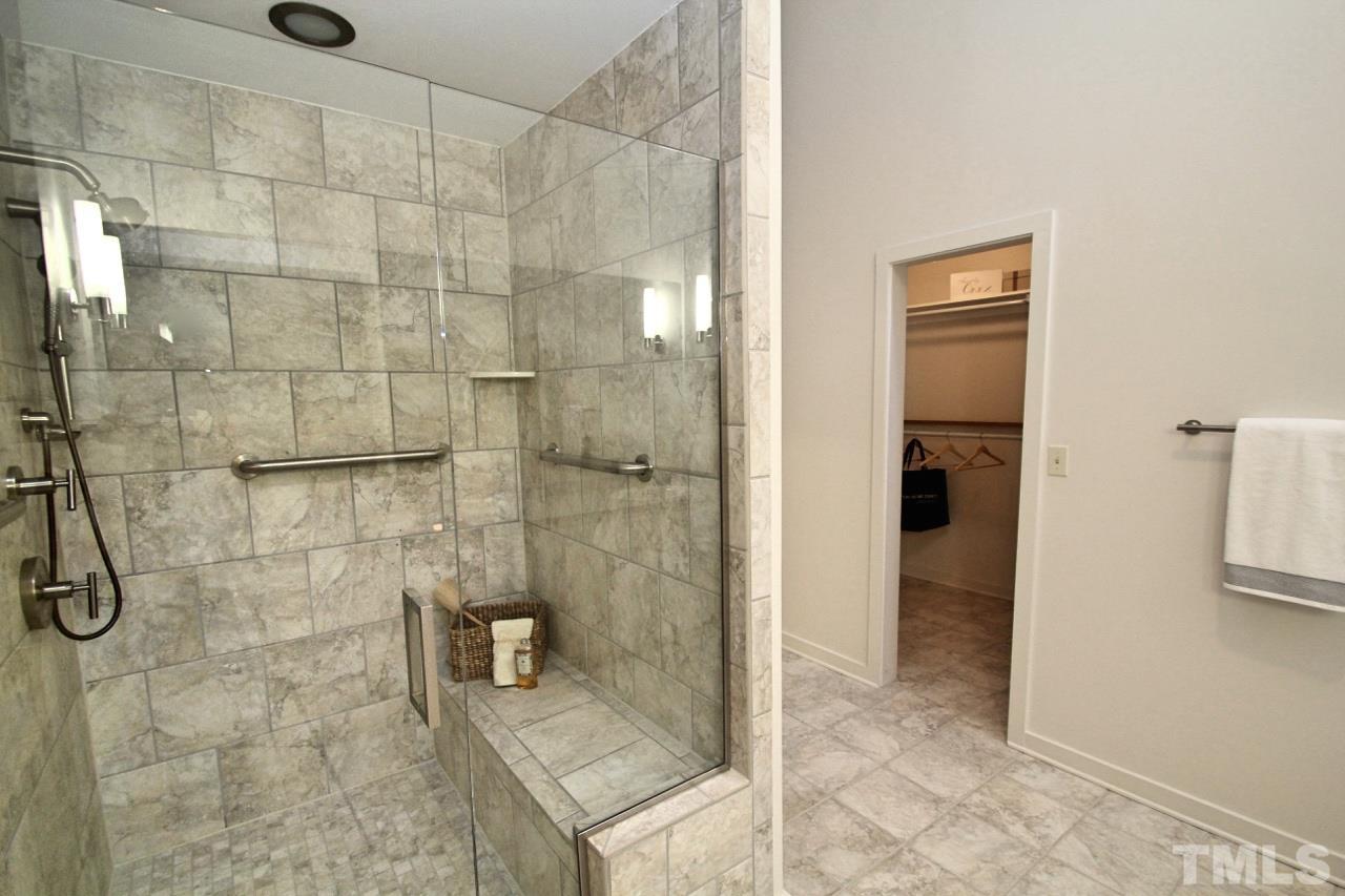 122 Queensferry Road Cary, NC 27511 - Photo 13 of 25 a bathroom with a shower and a sink