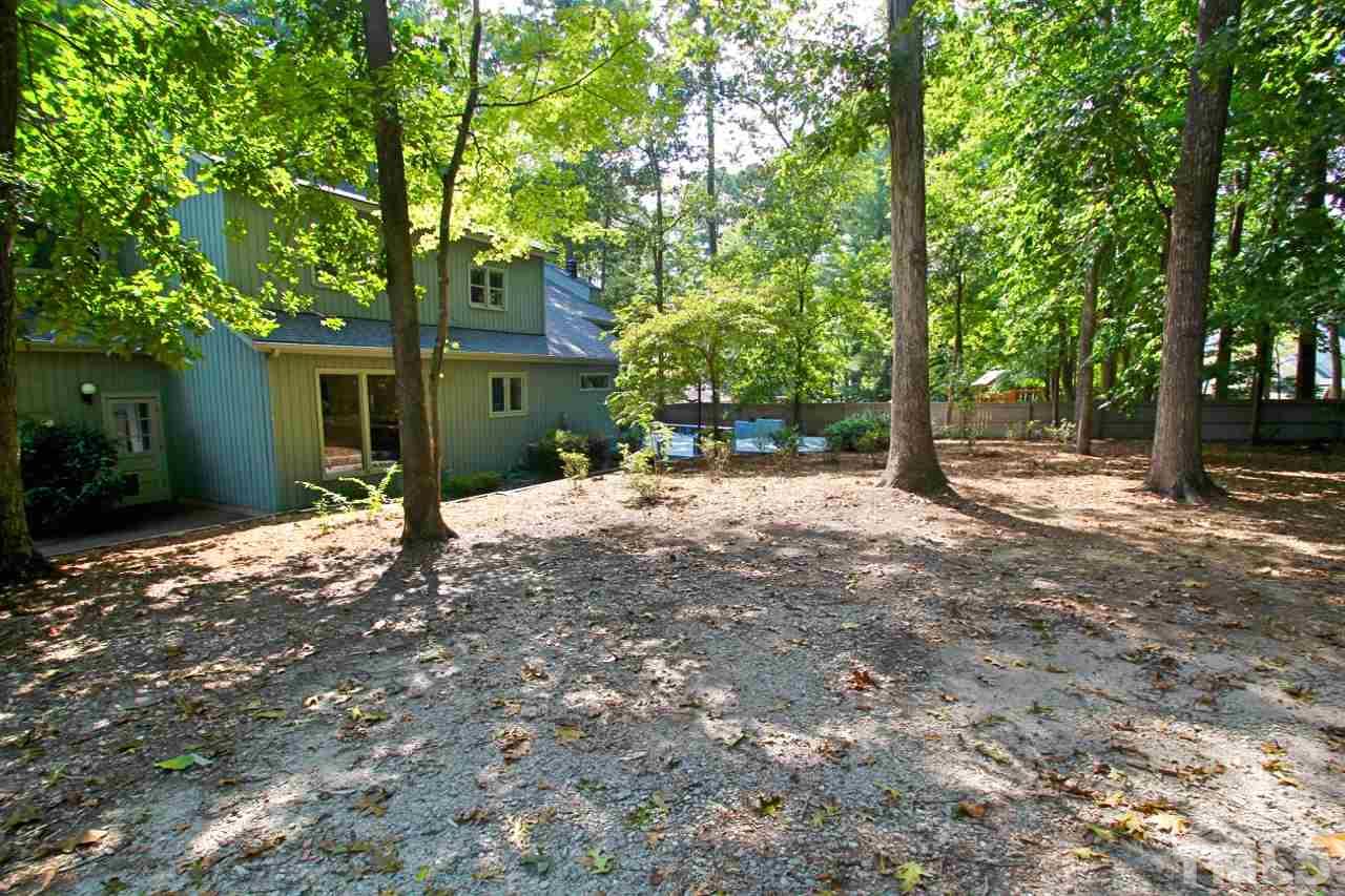 122 Queensferry Road Cary, NC 27511 - Photo 24 of 25 a view of a house with a tree in the background