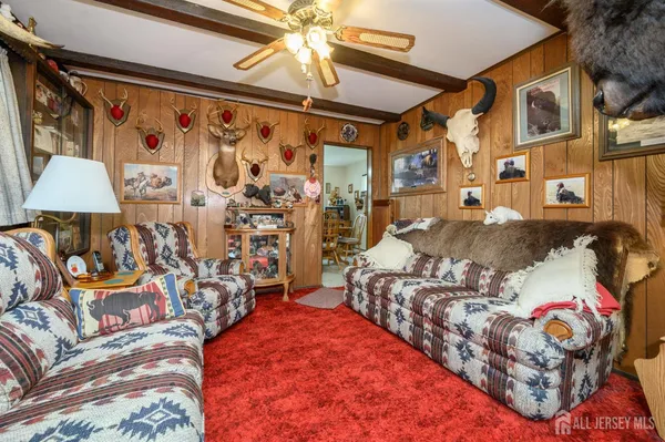 a bedroom with double bed and a window