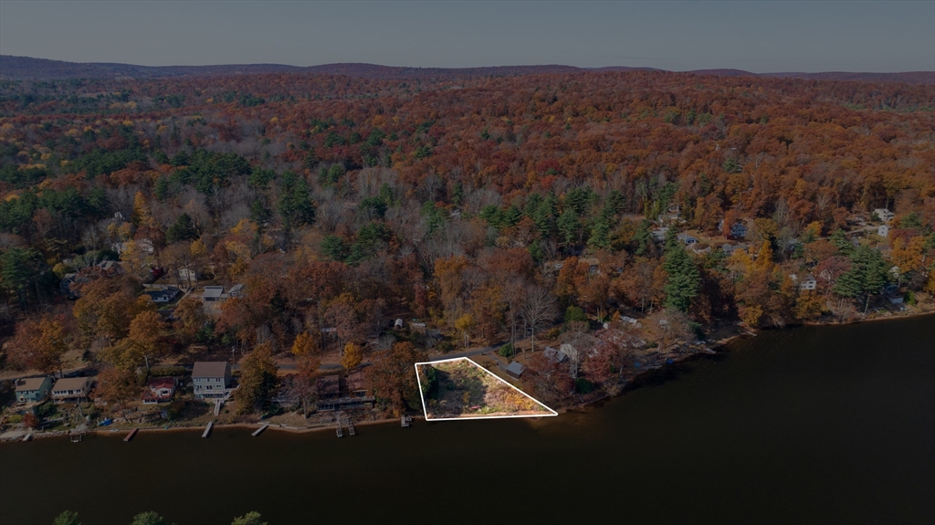 83 Sandy Beach Road Holland, MA 01521 - Photo 5 of 13 an aerial view of house with outdoor space and trees all around