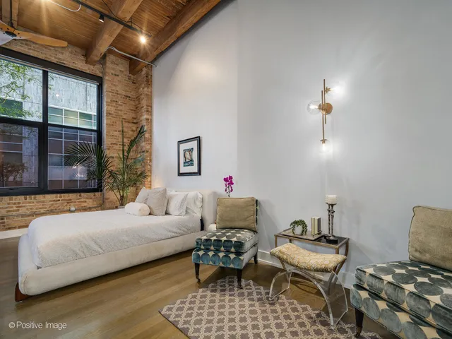 a bathroom with a tub sink and vanity