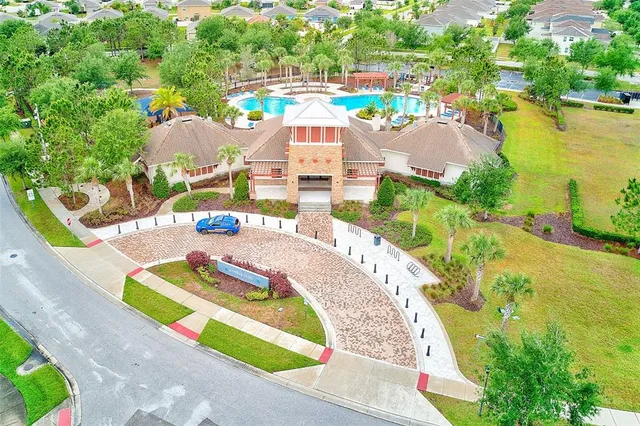 a view of a swimming pool with a patio
