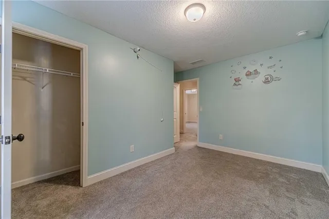 an empty room with a door