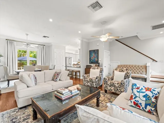 a living room with furniture and a couch