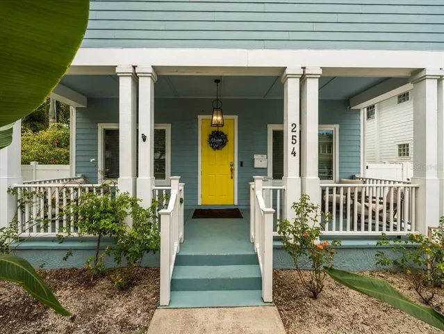 a front view of a house with a porch