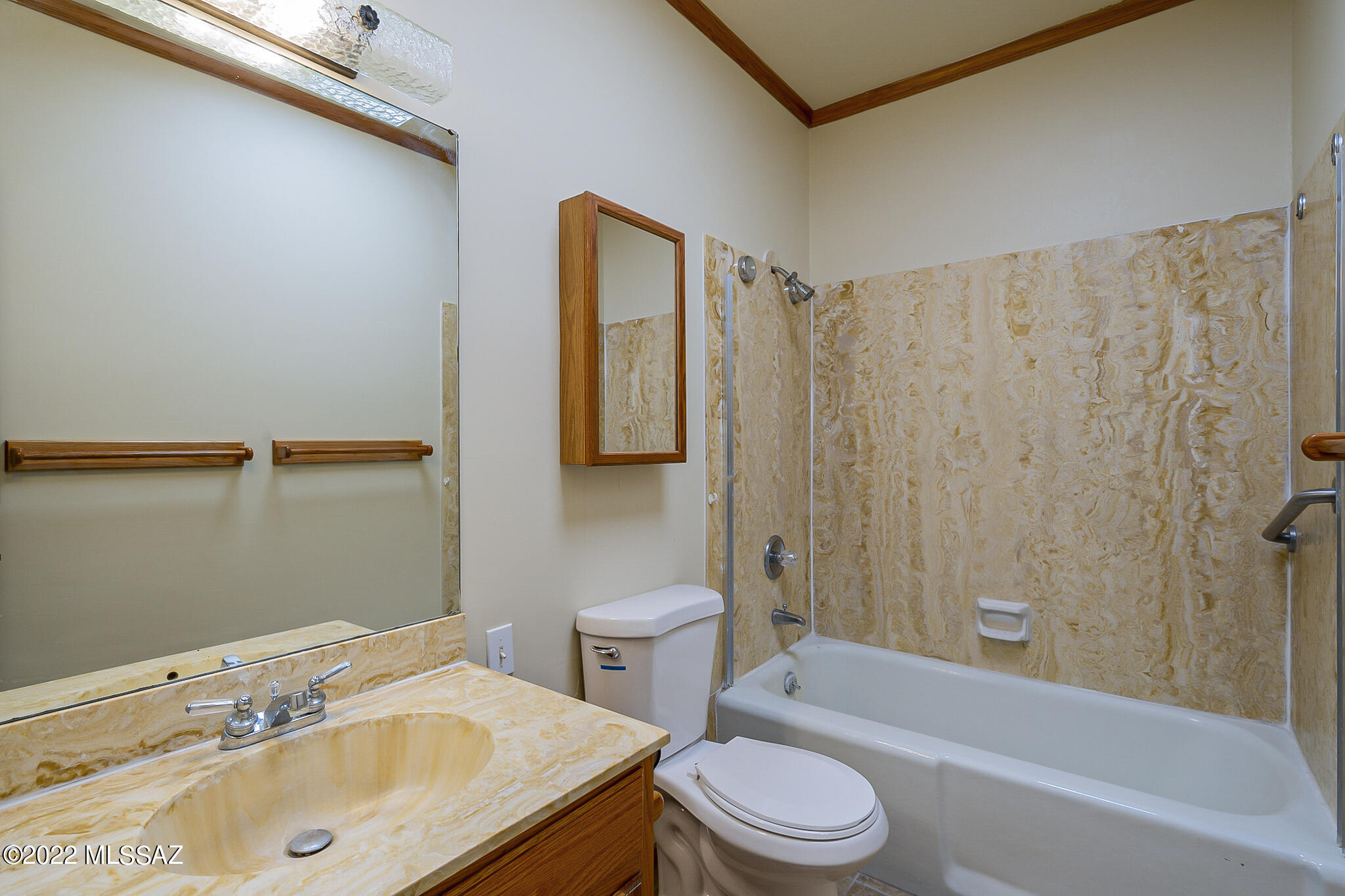 8951 East Bears Path Road Tucson, AZ 85749 - Photo 30 of 41 a bathroom with a sink toilet and shower