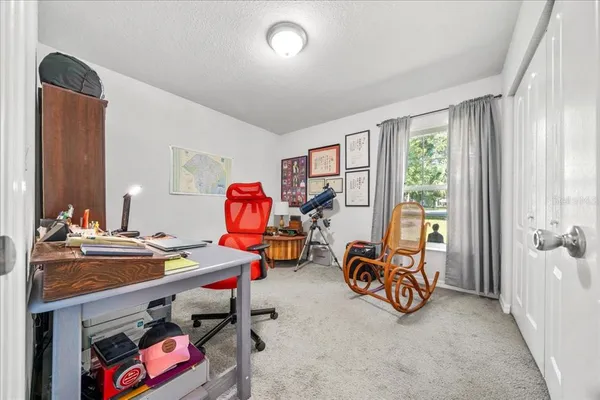 a room with furniture and a chandelier