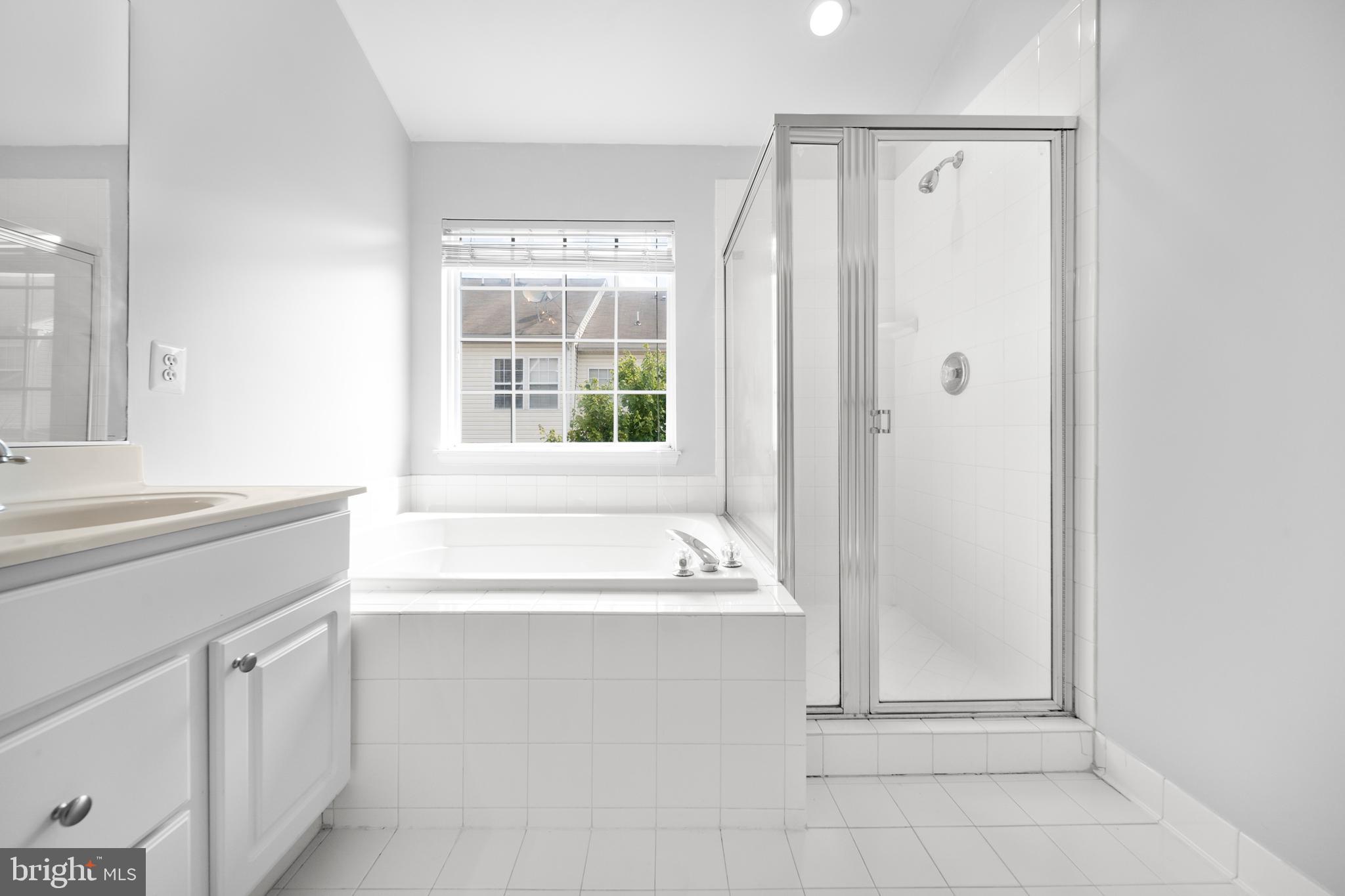 2631 Tarleton Corner Drive Herndon, VA 20171 - Photo 28 of 41 a bathroom with a sink and a bathtub