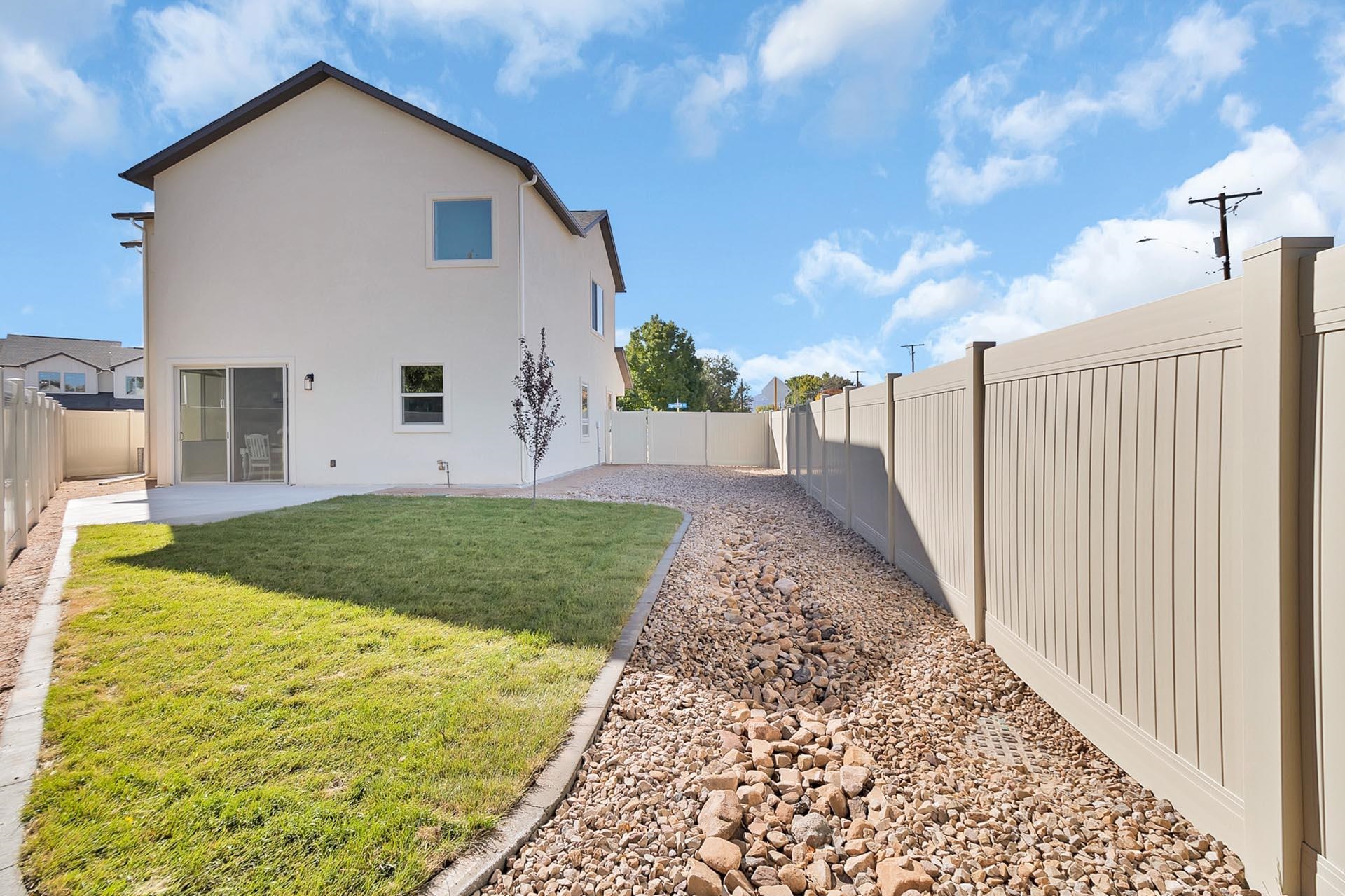 1105 Sprocket Court Fruita, CO 81521 - Photo 36 of 42 a view of a house with backyard