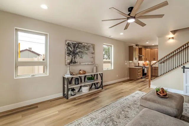 a living room with furniture and a window
