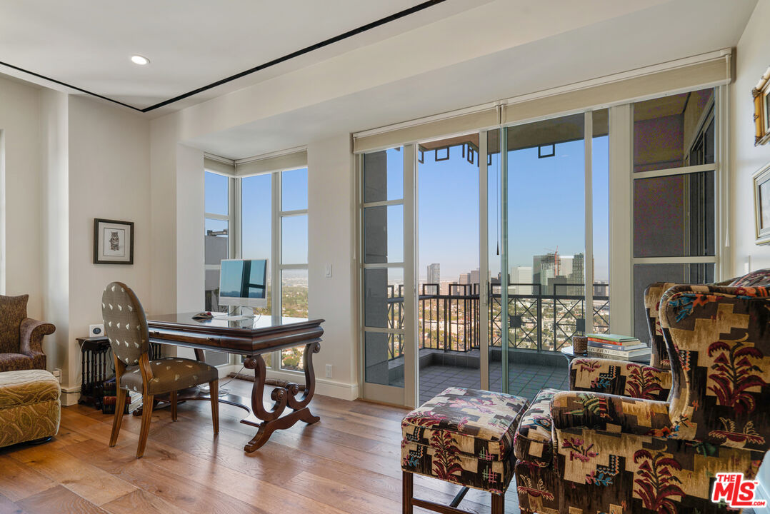 10580 Wilshire Boulevard, Unit 23NE Los Angeles, CA 90024 - Photo 27 of 42 a workspace with furniture and a window