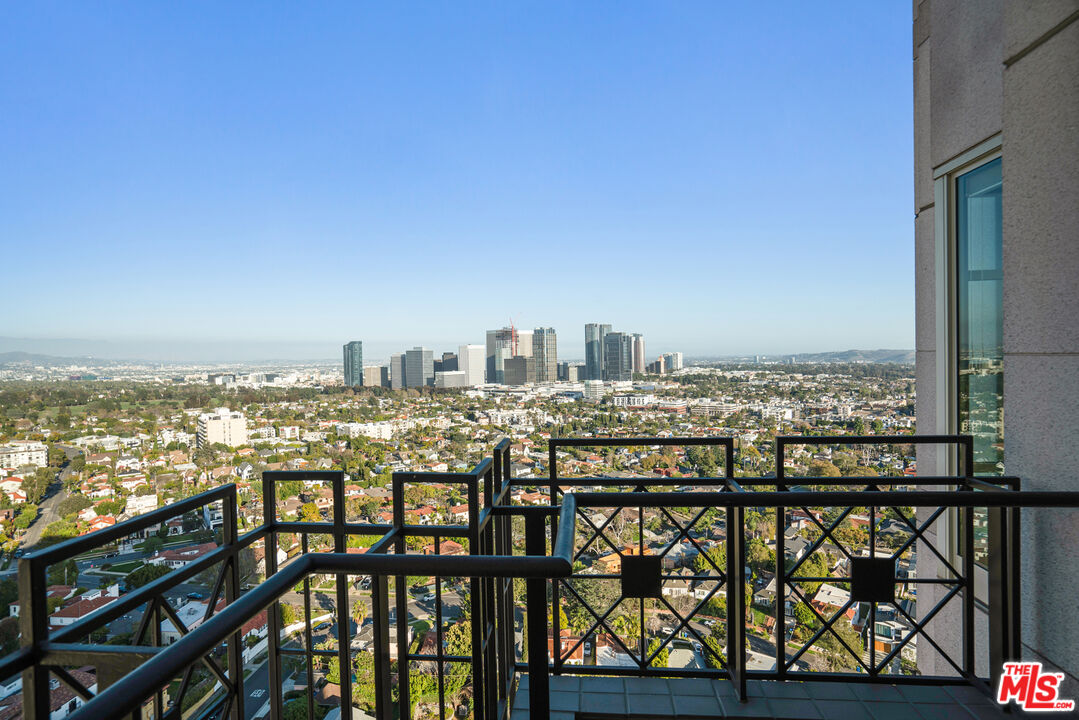 10580 Wilshire Boulevard, Unit 23NE Los Angeles, CA 90024 - Photo 28 of 42 a view of a city from a balcony