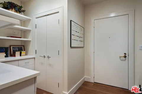 a view of cabinets with wooden floor and cabinet