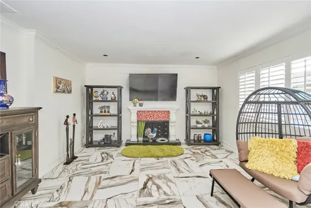 a view of a livingroom with furniture and staircase