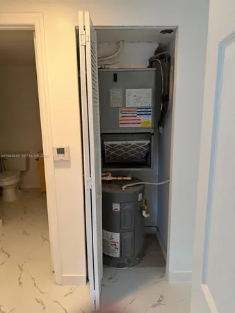 a view of storage and utility room